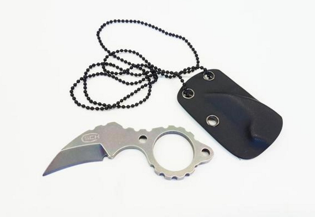 coltello karambit tascabile con fodero rigido
