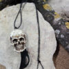 collana teschio con coltello