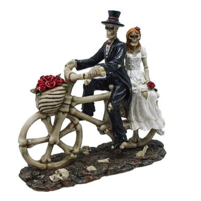 teschio coppia di sposi in bicicletta